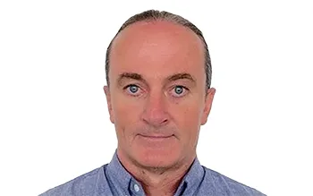 headshot of a middle-aged Caucasian man in a light blue shirt, senior management team member at provide cars, specializing in car auctions in Japan.