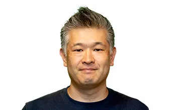 portrait of an Asian male, part of the sales team at provide cars, expert in car auctions across Japan.