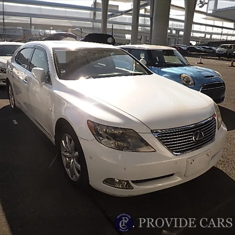 White Lexus purchased through Japan car auction, awaiting shipment.