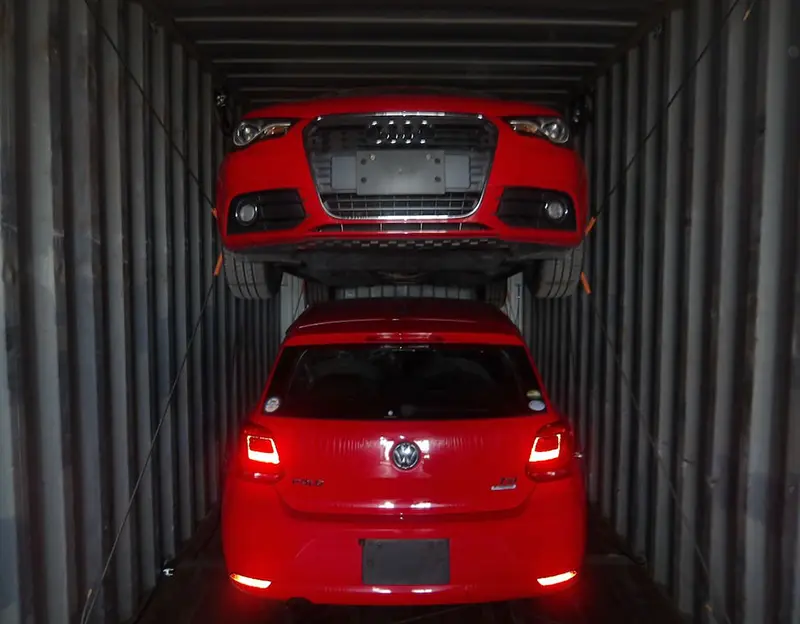 Vehicles purchased from Japan car auctions loaded in a shipping container for export.