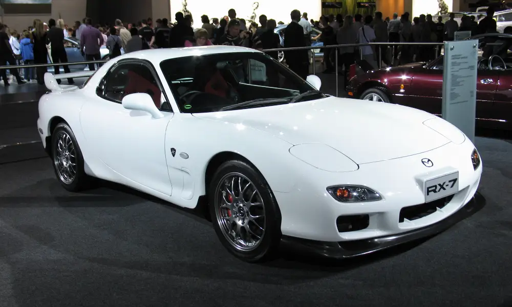 A JDM rotary-engine sports car, the Mazda RX-7 FD3S. Famous for its sleek design and exceptional driving performance.